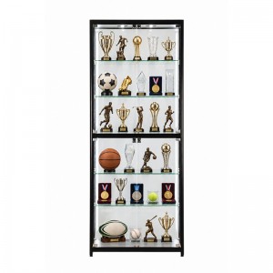 A trophy and sports memorabilia displayed on supports inside a freestanding glass case (6)
