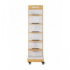 Freestanding shoe display tower with wood-look shelves, a branded header and caster wheels (1)