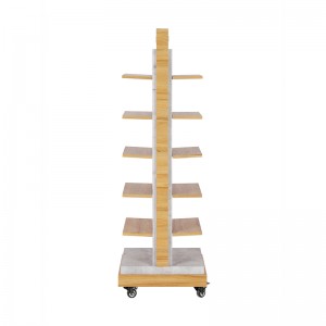 Freestanding shoe display tower with wood-look shelves, a branded header and caster wheels (3)