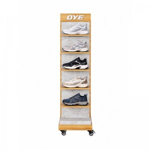 Freestanding shoe display tower with wood-look shelves, a branded header and caster wheels (4)